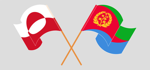 Obraz premium Crossed and waving flags of Greenland and Eritrea