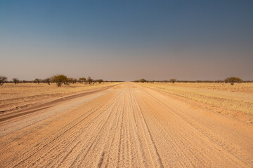 Fototapeta na wymiar Roadtrip in Damaraland, Namibia. Close up of a washboard gravel road in Namibia