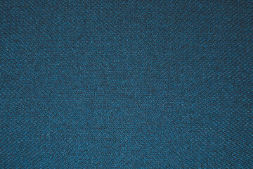 Dark blue denim background texture close up