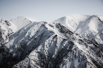 Snow capped mountains and rocky mountain ridges on a nice clear day