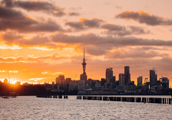 Auckland's Skytower and the cityscape at sunset