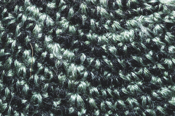 Knitted background close up. woolen fabric texture