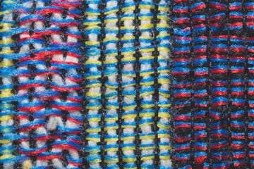 Colorful knitted wool background. woolen fibers macro