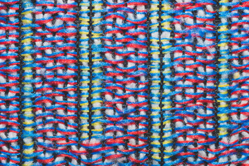 Obraz premium Colorful knitted wool background. woolen fibers macro