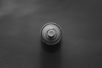 Can of spray paint black and white