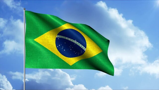 The Brazilian flag. Motion. A developing flag of a Latin American country, a patriotic symbol in the daytime sky.