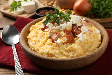 Delicious traditional Ukrainian banosh served on wooden table