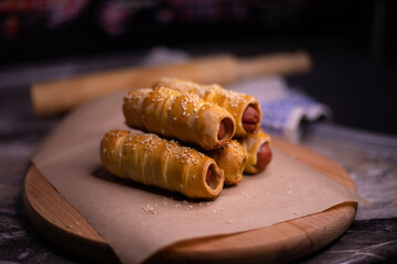 Cooking homemade sausages in dough