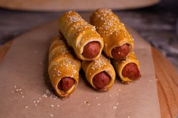 Cooking homemade sausages in dough