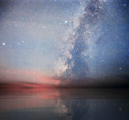 Sailing over Calm Waters and under a Starry Sky - obrazy, fototapety, plakaty