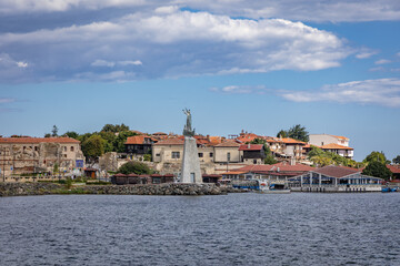 Old Town of Nesebar city in Bulgaria, statue of Saint Nicholas on foreground
