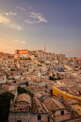 Wide view of Piazzetta Pascoli, Belvedere di Matera sul Sasso Caveoso, at sunset, vertical