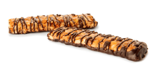 Tasty chocolate nut bars on white background