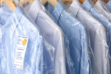 Clean shirts in plastic bags, closeup