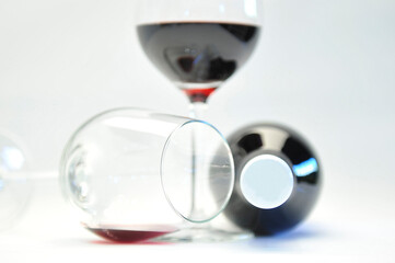 glass of red wine on white