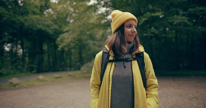 Woman whistling before a hike