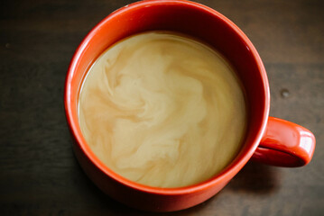 coffee with cream foam shaped as a heart