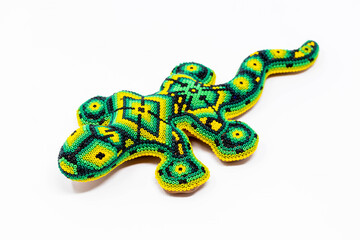 Beautiful huichol tradition pattern crafted lizard