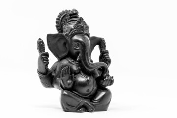 Close up black statue of Lord Ganesha isolated