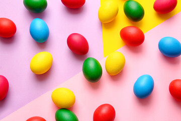 Multicolored Easter eggs on color background