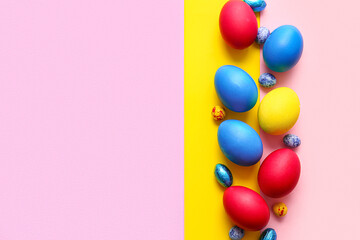 Fototapeta na wymiar Different painted Easter eggs on color background