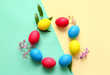Frame made of multicolored Easter eggs on color background