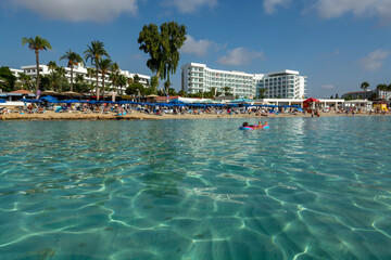 Crystal clear blue water of Mediterranean sea on Nissi beach in Ayia Napa, Cyprus