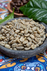 Green and roasted coffee beans from South America coffee producing region, from Colombia and Brazil with  mountain ranges and climate ideal for coffee growing