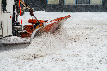Snow plow close up , of plowing the snow during Nyc snow storm