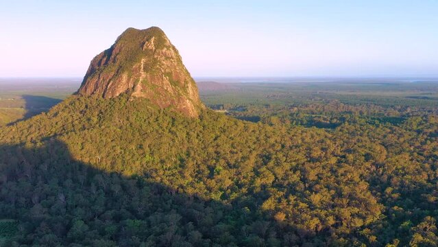 Aerial view of Mt Tibrogargan and Glass House Mountains at sunset, Sunshine Coast Hinterland, Queensland, Australia.