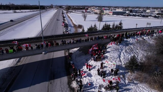 Freedom Rally 2022 drives past supporters protesting the vaccine mandates in Casselman, Ontario on their way to Ottawa.