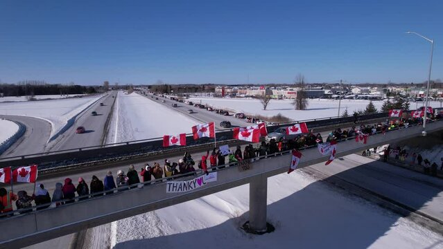 Freedom Rally 2022 drives past supporters protesting the vaccine mandates in Casselman, Ontario on their way to Ottawa.