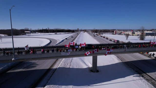 Freedom Rally 2022 drives past supporters protesting the vaccine mandates in Casselman, Ontario on their way to Ottawa.