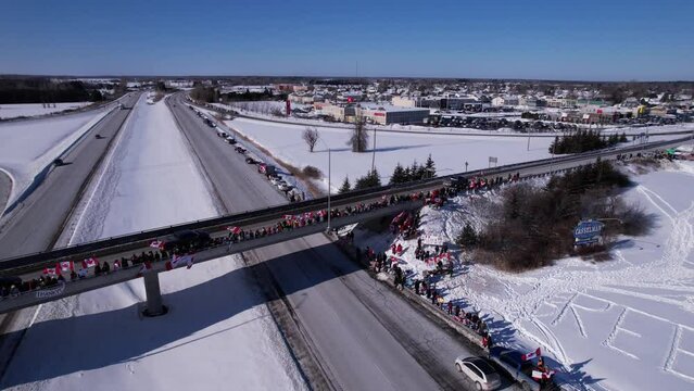 Freedom Rally 2022 drives past supporters protesting the vaccine mandates in Casselman, Ontario on their way to Ottawa.