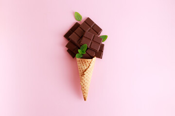 dark chocolate pieces in ice cream cone.