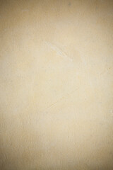 Beige real leather background.