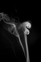 White smoke on black background.