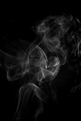 White smoke on black background.