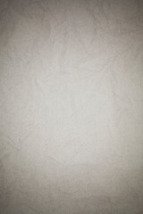 Crumpled white paper background.