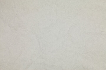 Crumpled white paper background.