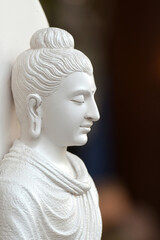 side of white stone buddha