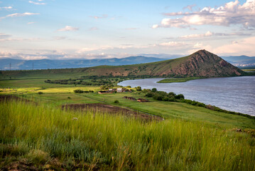 Selenga river with a hill in the suburb of Ulan-Ude in summer