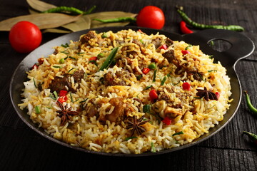 Arabic cooking - delicious mutton biryani, lamb meat pilaf. Arabian cuisine.