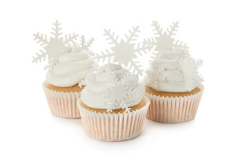Tasty Christmas cupcakes with snowflakes on white background