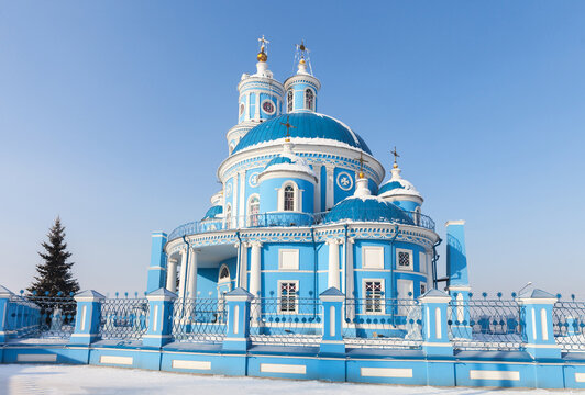 An outstanding architectural landmark of Eastern Siberia is beautiful old Orthodox church in honor of Kazan Icon of Mother of God in style of classicism of 1816 in village of Telma, Irkutsk region