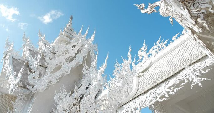 Chiang Rai, Thailand, January 2022. White Temple (Wat Rong Khun) is one of the most famous attractions of Northern Thailand, Amazing Thailand travel concept.