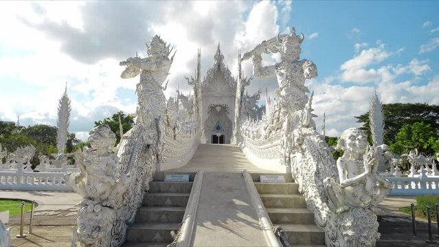Chiang Rai, Thailand, January 2022. White Temple (Wat Rong Khun) is one of the most famous attractions of Northern Thailand, Amazing Thailand travel concept.