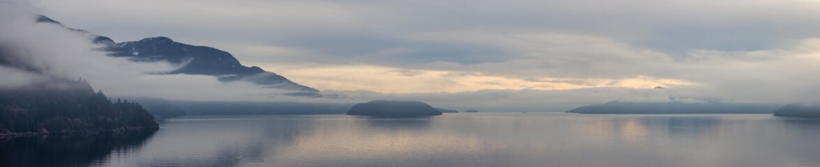 Scenic Canadian Nature View on the Pacific West Coast during cloudy and foggy winter day. Howe...