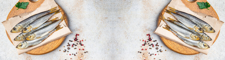 smoked sprat fish herring salted seafood meal food snack on the table copy space food background 