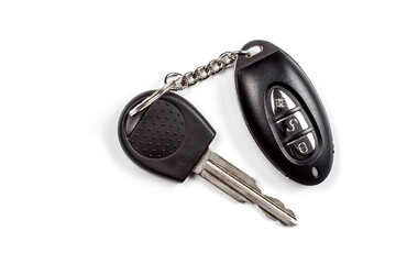 Car keys with an alarm key fob on a white background.